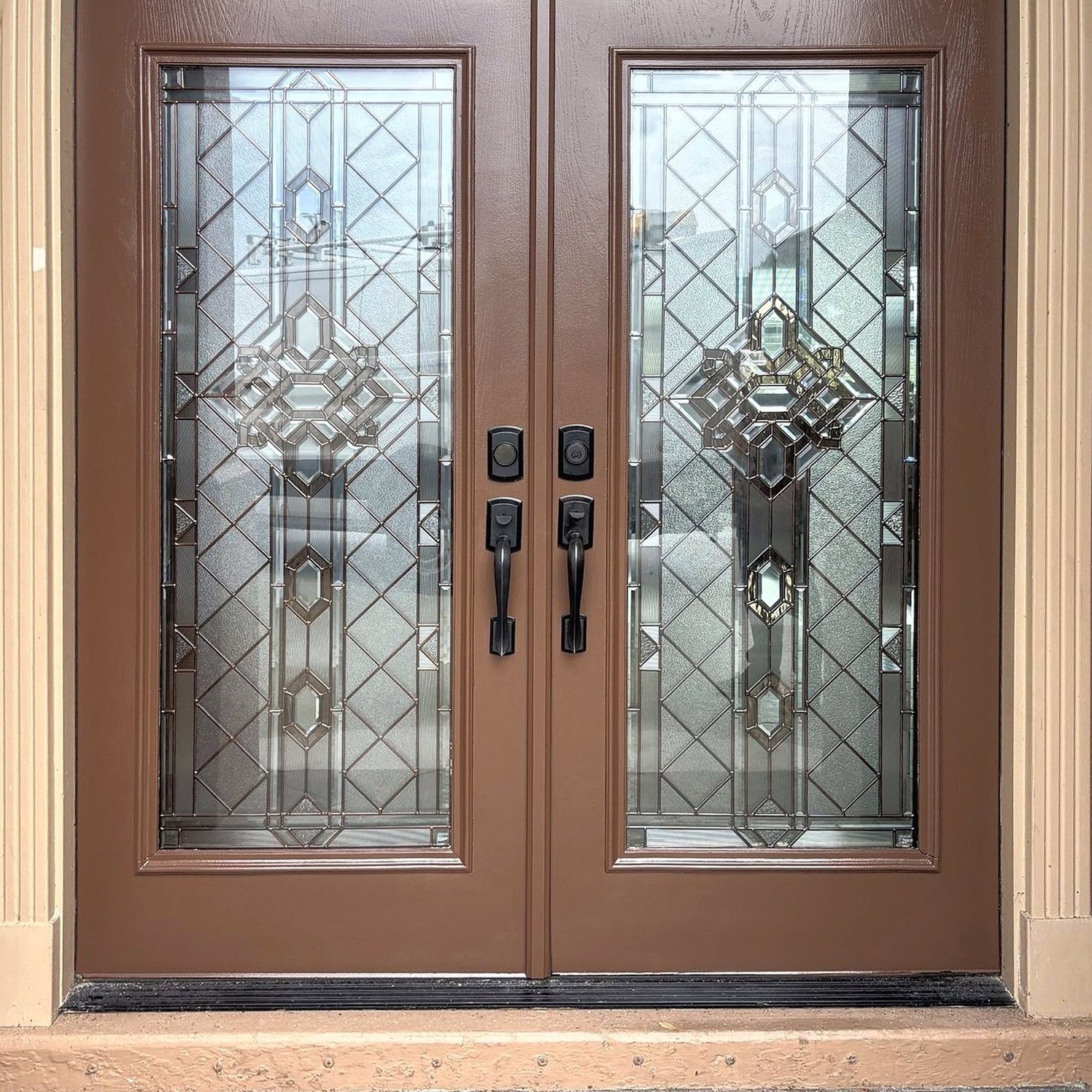 Front entry doors refinished in brown
