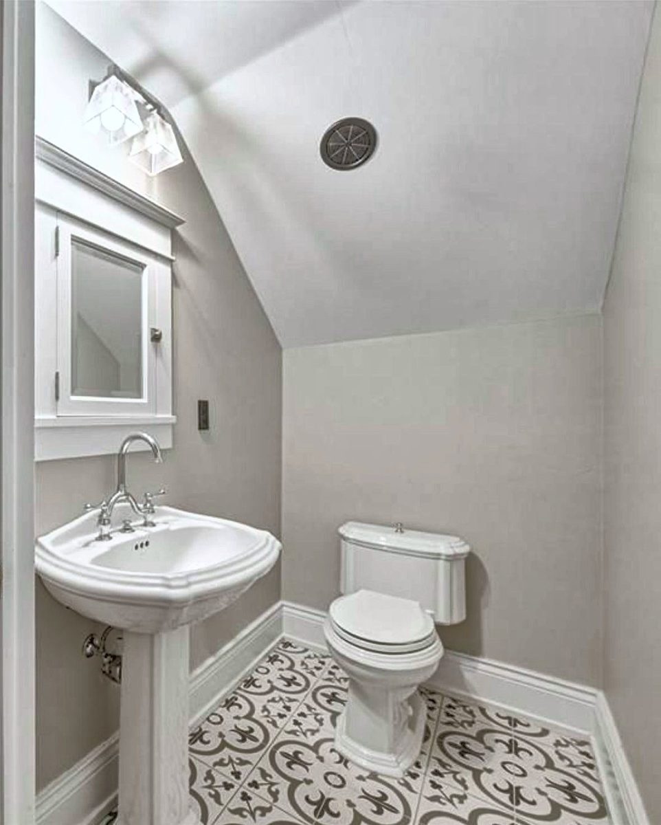 Powder room painted in soft white